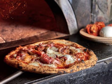 Dough pizzeria napoletana - Buzzy eatery with authentic Neapolitan pizzas, salads, housemade burrata & an all-Italian wine list.